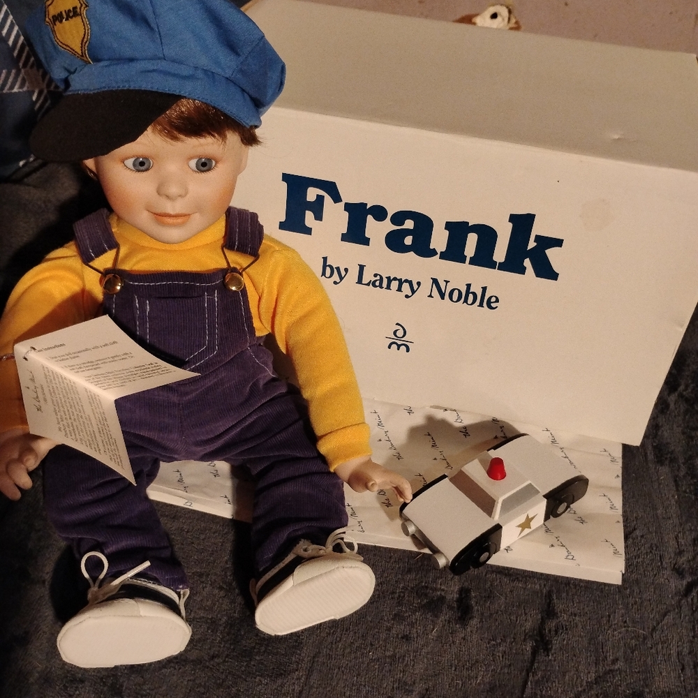Frank Danbury Mint Boy porcelain Doll. Like new 1993. Never stored out of box.